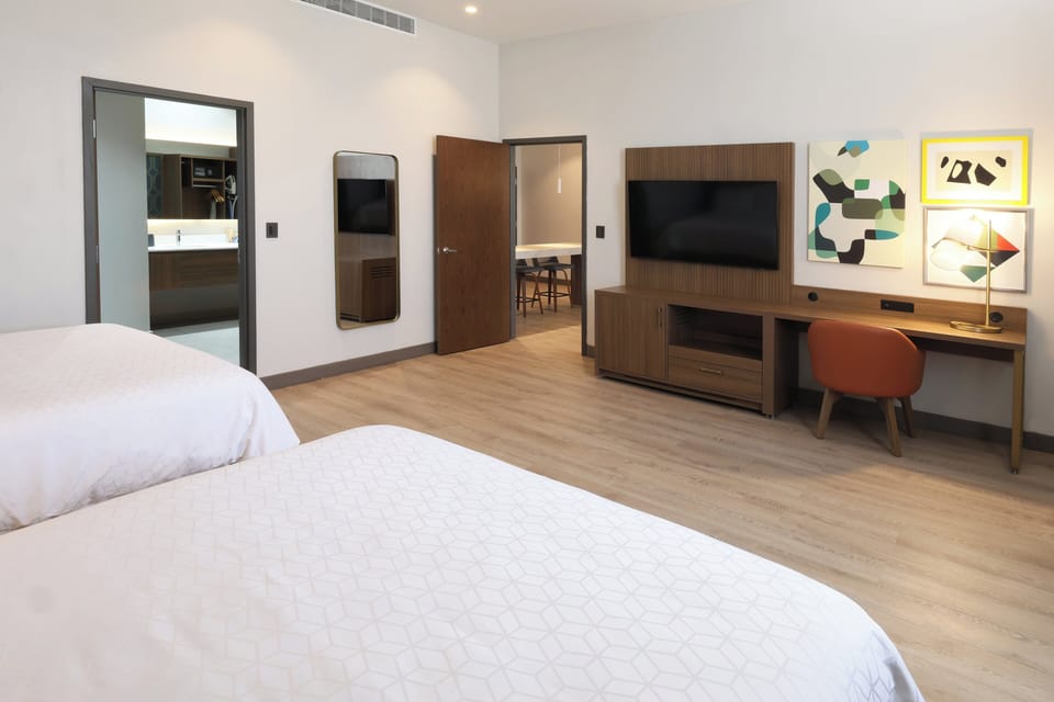Suite, Multiple Beds | Premium bedding, down comforters, pillowtop beds, in-room safe
