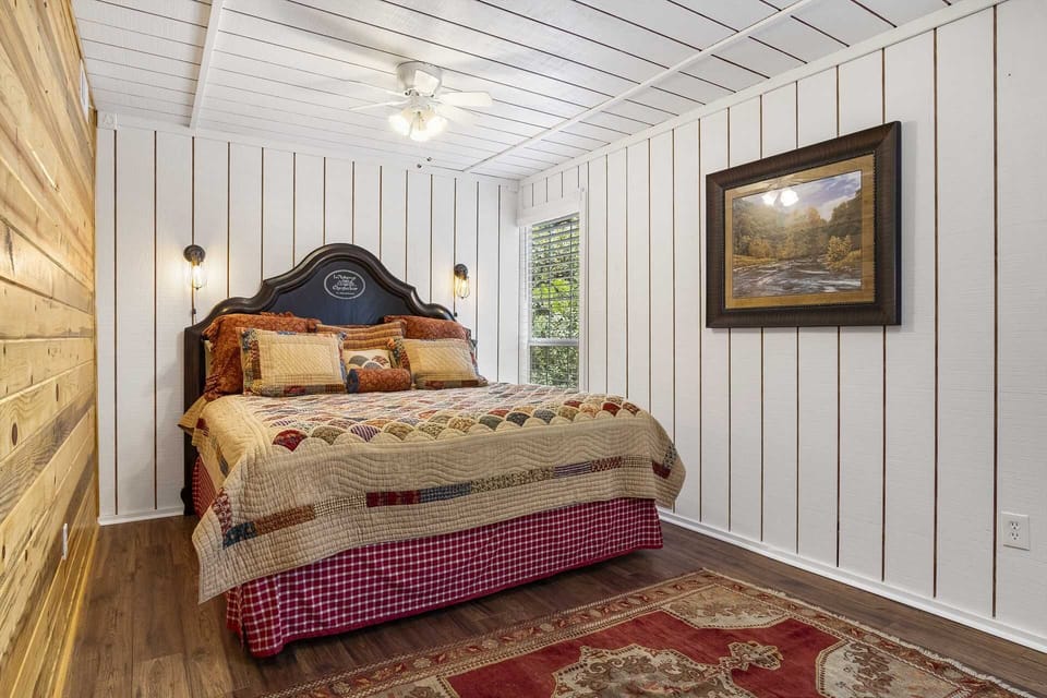 A vintage French bed frame supports the master bed. With the queen-sized futon/bed combo downstairs, the Hawk's nest comfortably sleeps four.