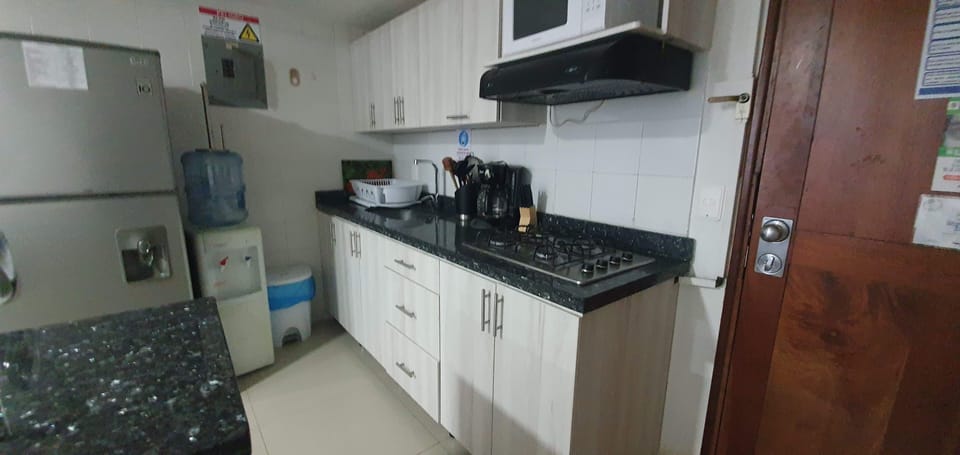 Apartment | Private kitchen | Fridge, microwave, oven, rice cooker