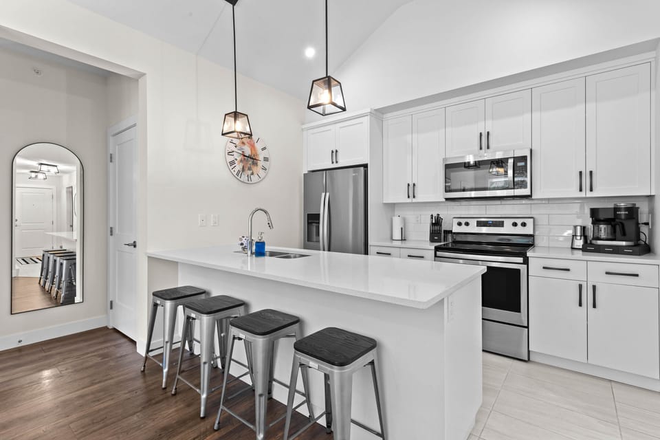 The modern kitchen is well stocked with everything needed to cook & dine in. Keurig coffee machine with some pods are provided as well as Starbucks ground coffee for the drip machine.
