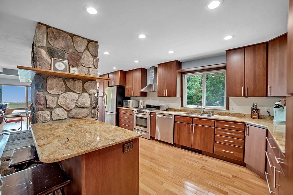 Huge kitchen with a gas range and tons of counter space