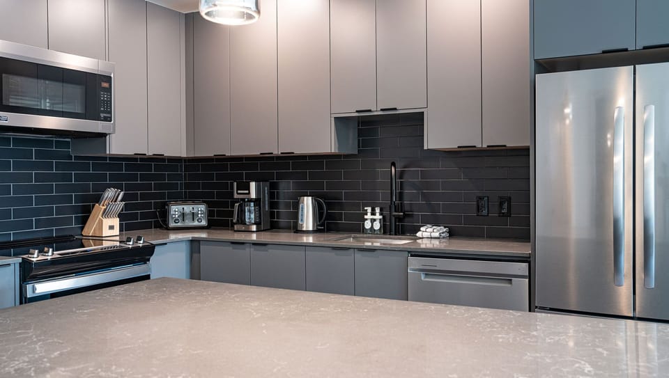 Condo | Private kitchen | Coffee/tea maker, full-size fridge, microwave, oven