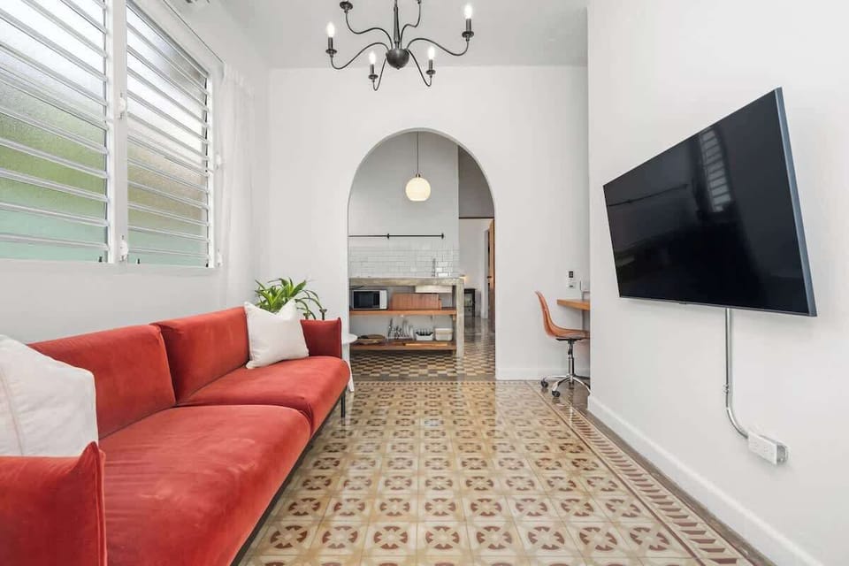Indulge in relaxation in the living room, complete with a TV