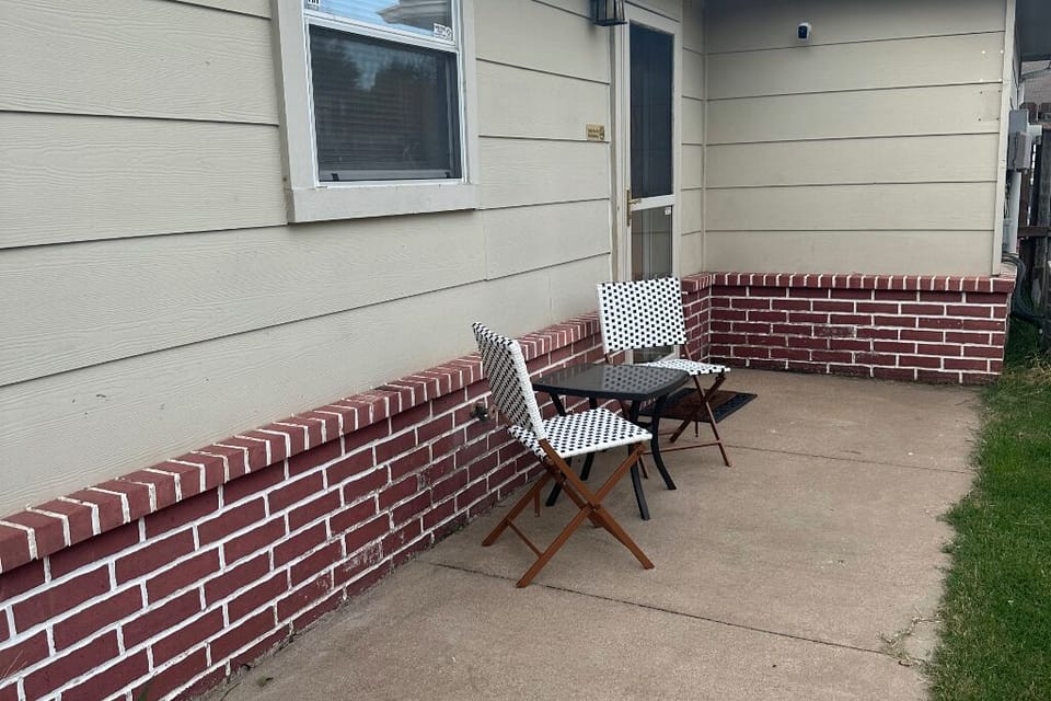 Comfortable outdoor space.  More chairs in the garage