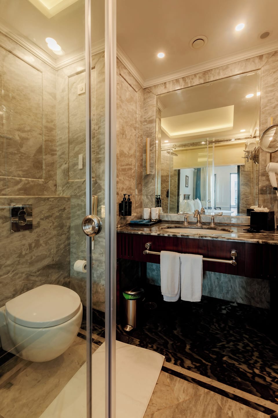Hair dryer, slippers, towels, soap