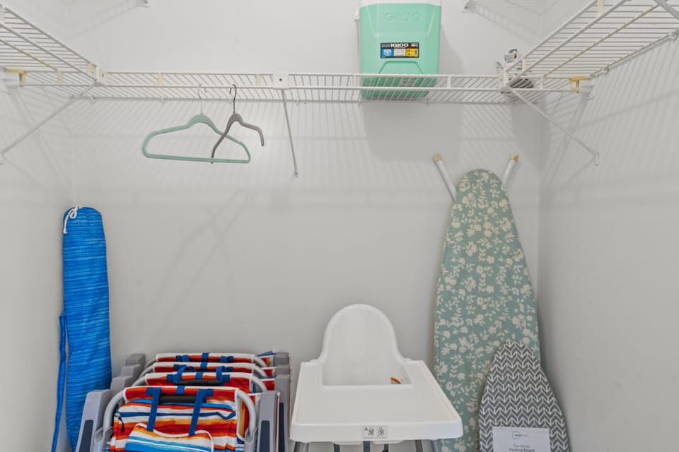 Your home away from home, with all the extras! 🏡 Our Master Closet includes a highchair 👶, beach chairs 🏖️, a cooler 🧊, and an ironing board ủi – making your stay effortless! ✨