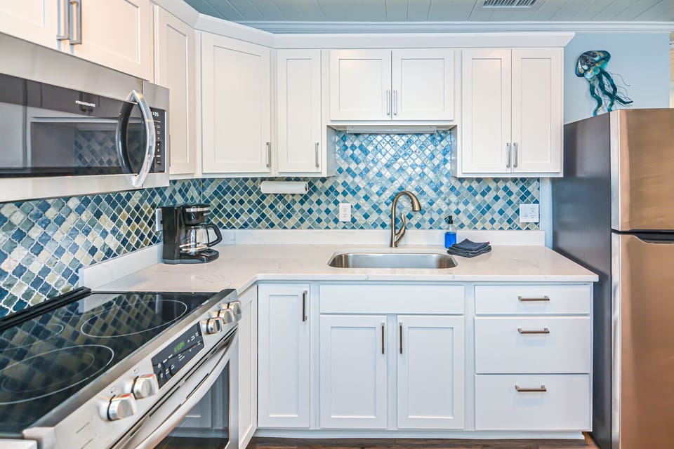 Kitchen including coffee maker and keurig