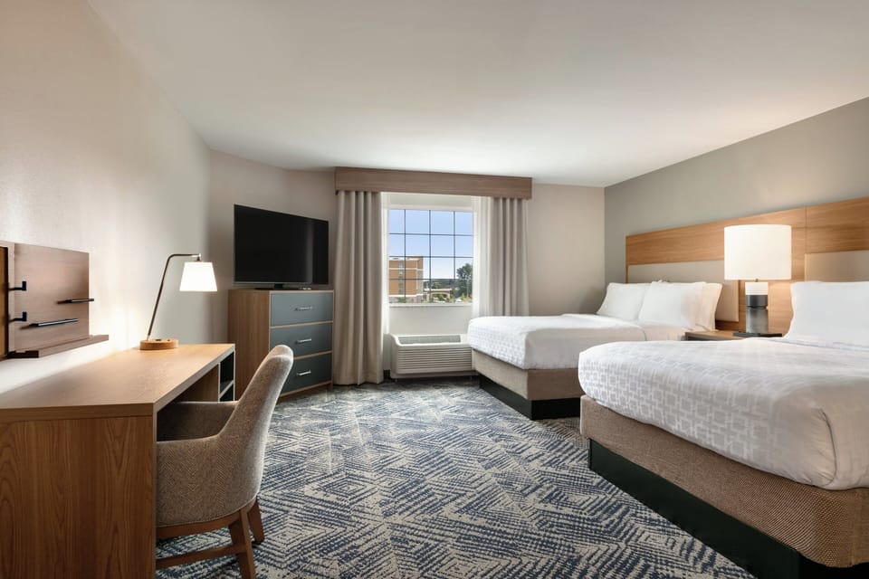 Studio Suite, 2 Double Beds | In-room safe, desk, laptop workspace, blackout drapes