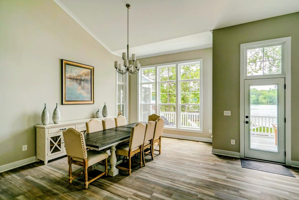 Dining area with a nice real wood table and comfortable seating for 8!