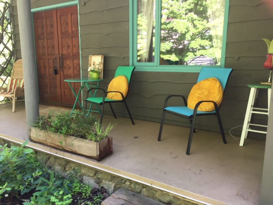 Front  doors. Porch overlooking garden  .