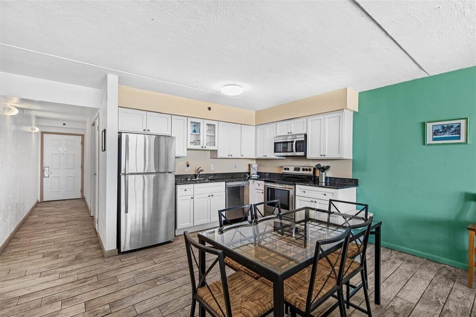 The Bright, White & Open Kitchen is sure to be a Chef's Dream!