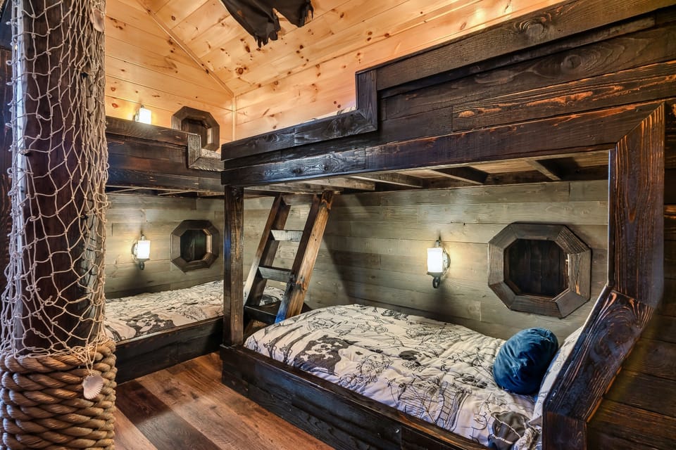 Custom pirate bunk beds can be found in the kids room. Soo much fun.
