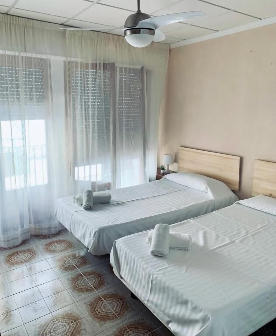 Double or Twin Room | Down comforters, memory foam beds, individually decorated
