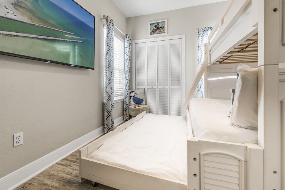 Bedroom #2: Twin top, Full size bottom, Twin pullout underneath bunkbed.