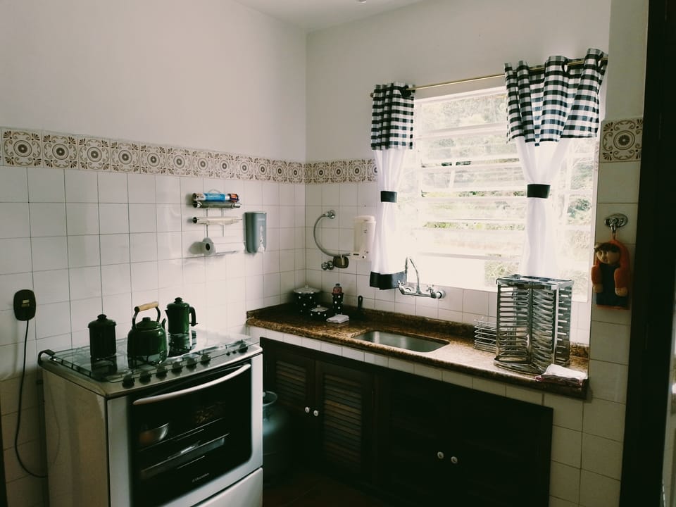Exclusive Cottage, Multiple Beds, Lanai, Lake View | Private kitchen | Full-size fridge, microwave, oven, blender
