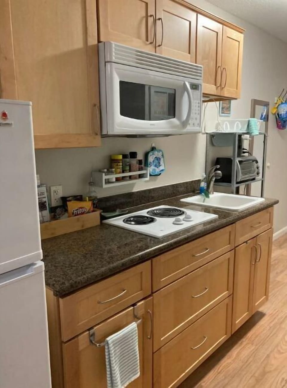 Be advised, no oven!  other amenities are provided.