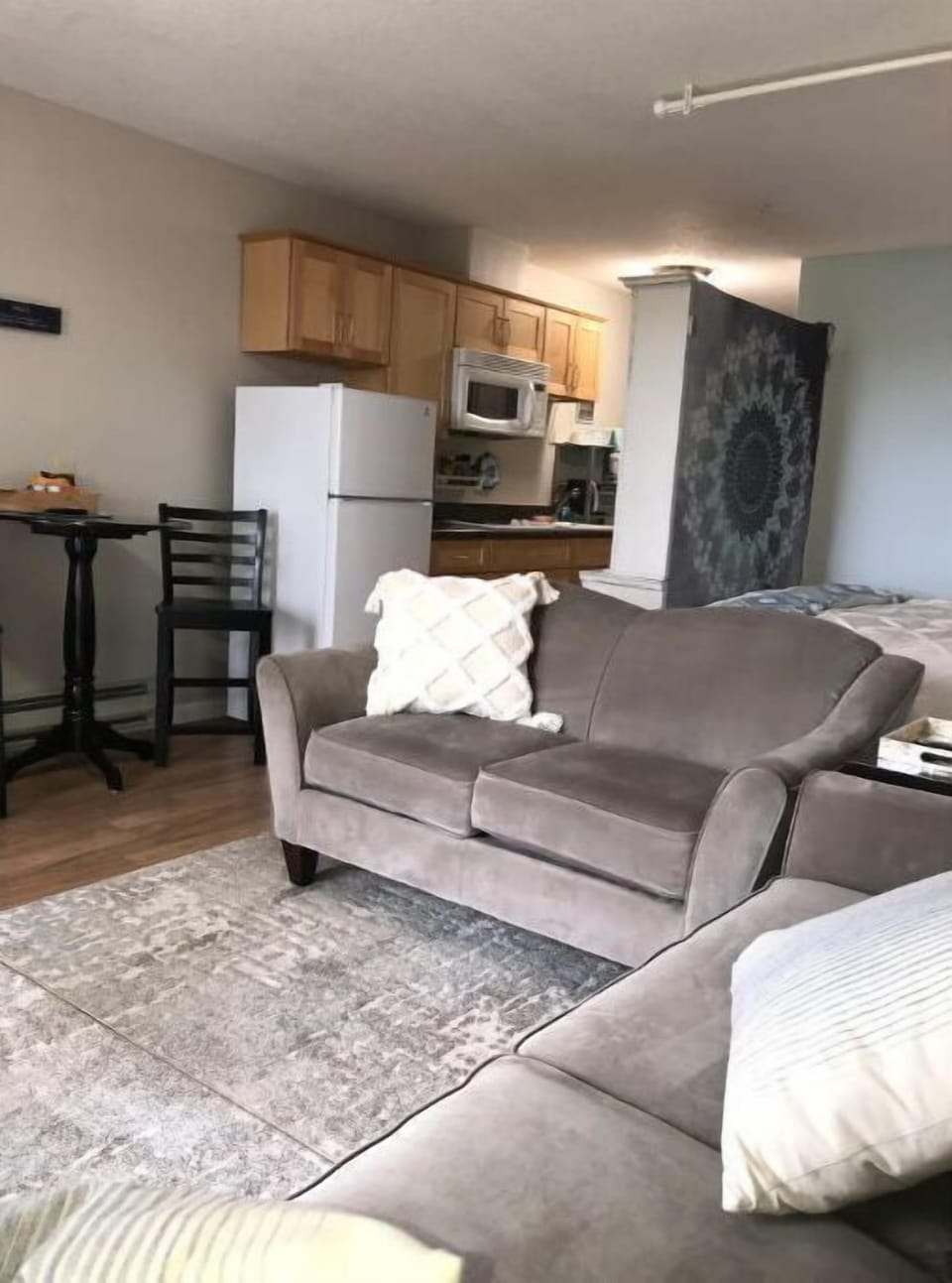 View of the kitchen,  no oven, there is a toaster,  air fryer, and toaster oven