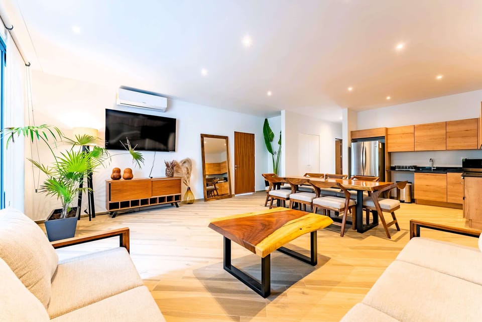 Living Room | Two sofas with smart TV and air conditioning for ultimate