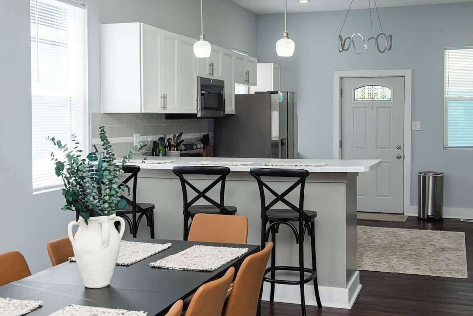Our newly renovated kitchen is outfitted with sleek stainless steel appliances and fully stocked with plenty of cups, dishes, and a variety of pots and pans for cooking. A dedicated coffee station provides everything you need for your morning brew.