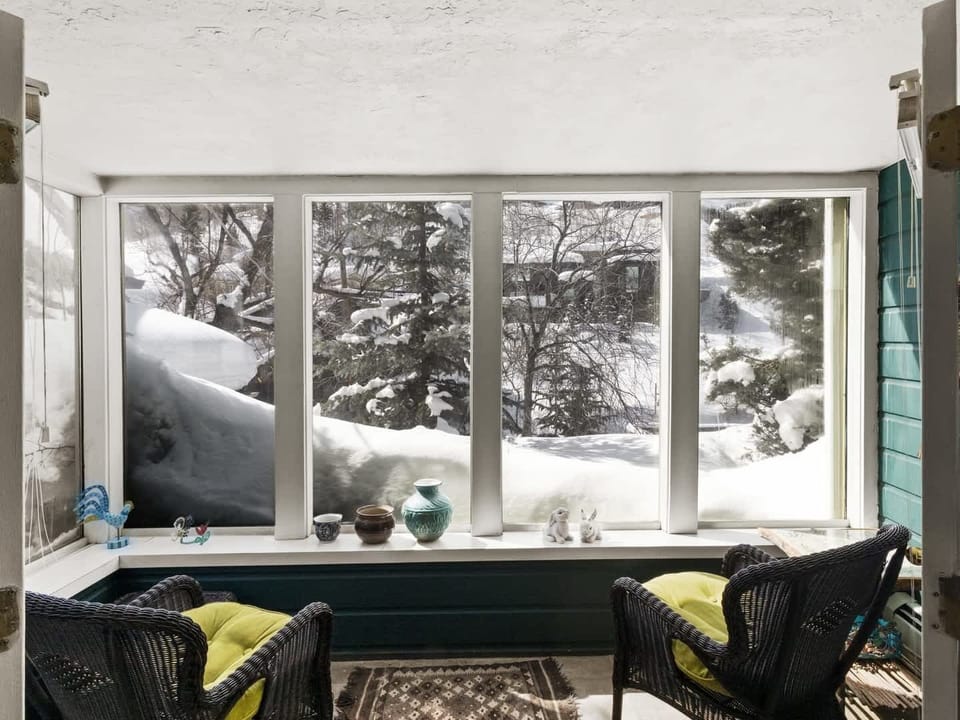 Enjoy your morning coffee while taking in the views from the inside patio located off the lower level living room.