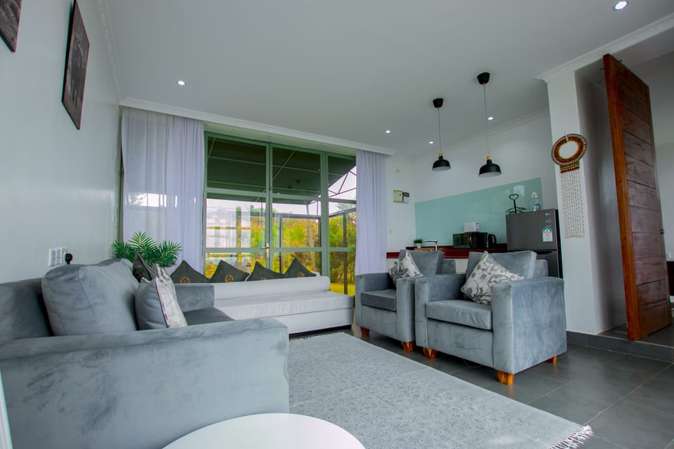 Exclusive Bungalow, 1 Bedroom | Living area | 45-inch flat-screen TV with digital channels