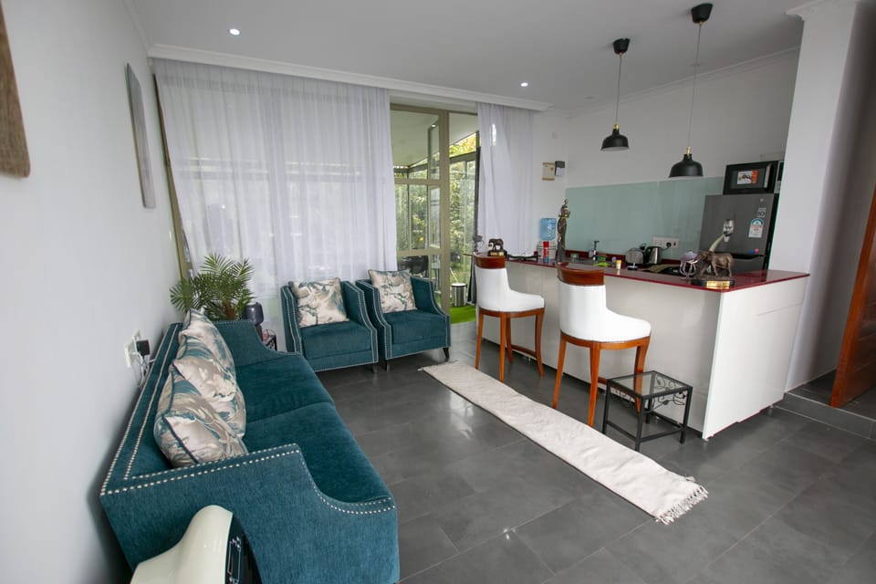 Exclusive Bungalow, 1 Bedroom | Living room | 45-inch flat-screen TV with digital channels