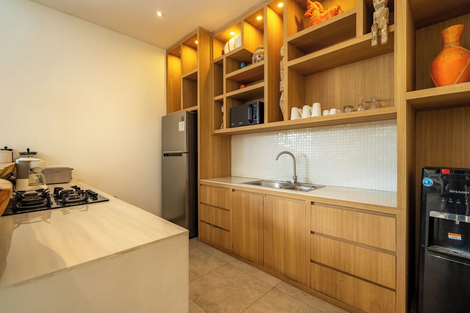 Luxury Villa | Private kitchen | Fridge, stovetop, electric kettle, toaster