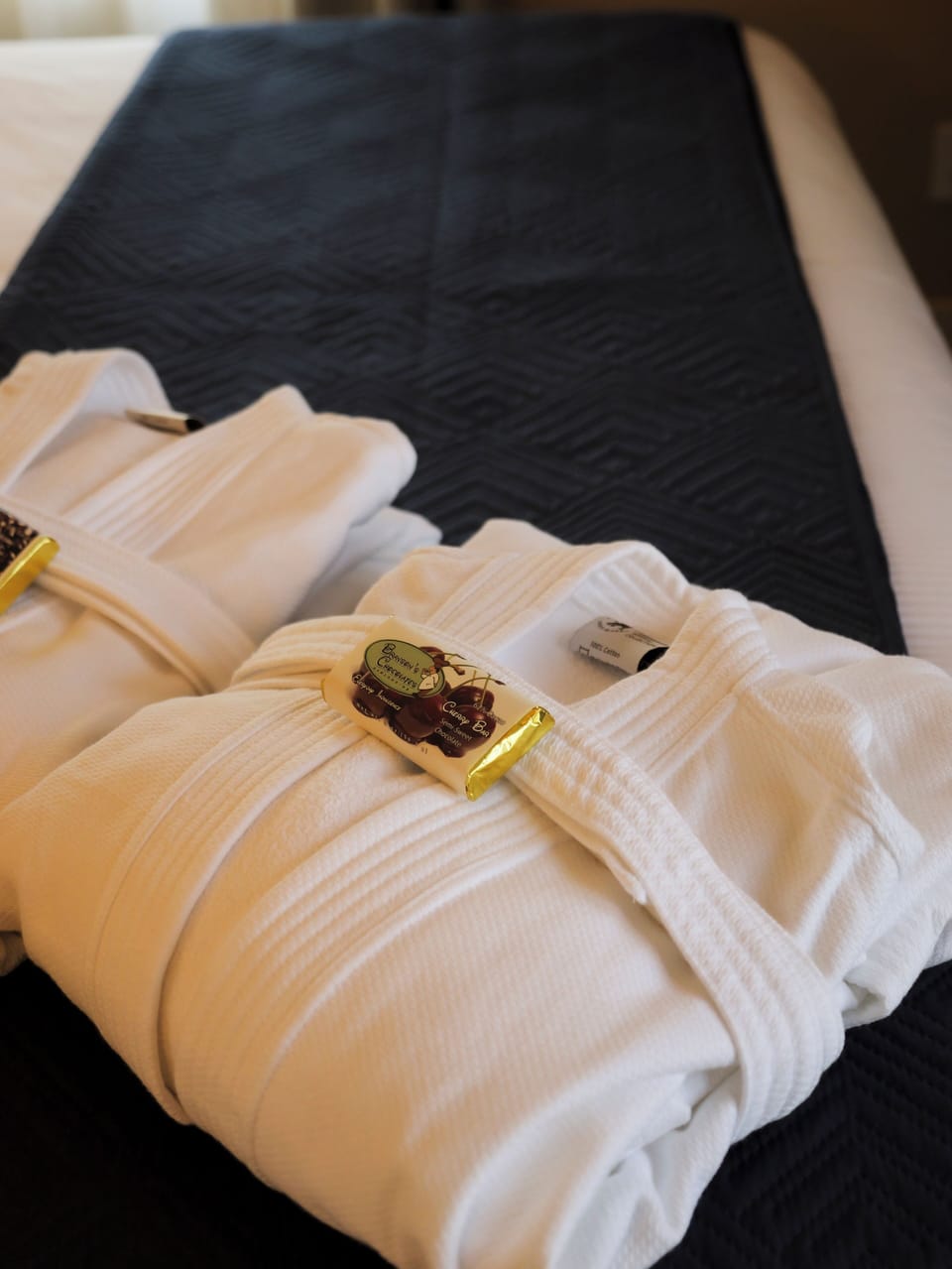 Plush robes and chocolates await, adding a touch of indulgence to your stay.