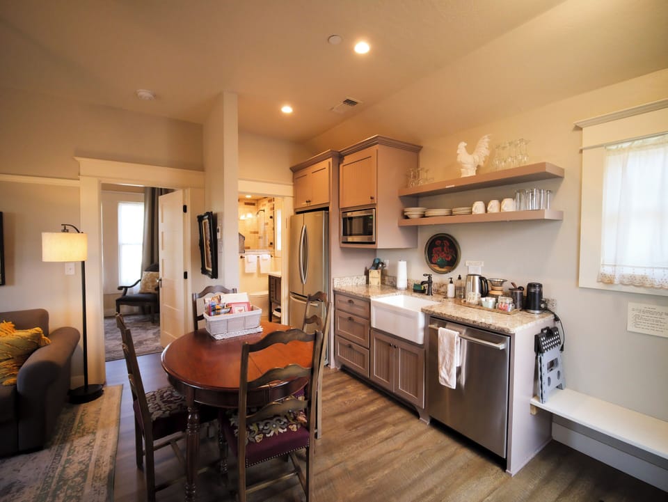 A seamless flow between the dining table and kitchen, ideal for meals and conversations.