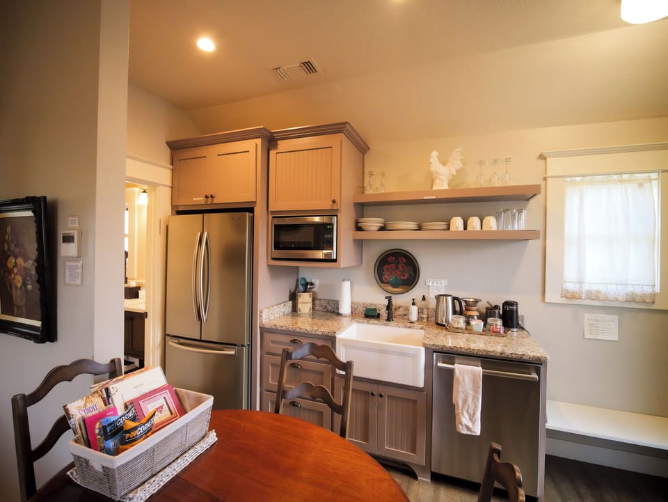 A well-equipped kitchen with modern appliances and rustic charm.