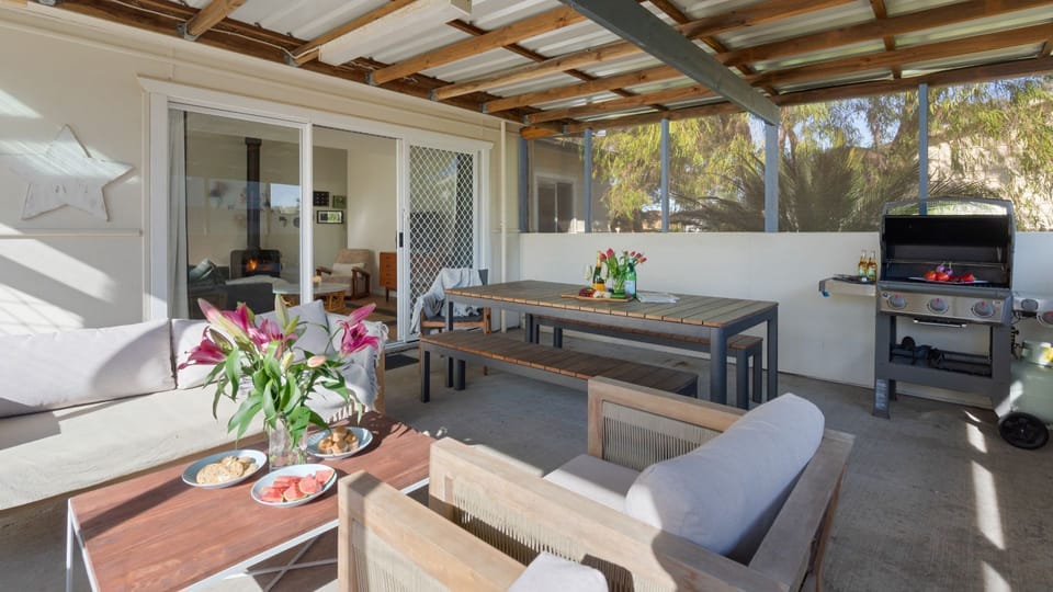 Bliss | Covered outdoor dining area | BBQ