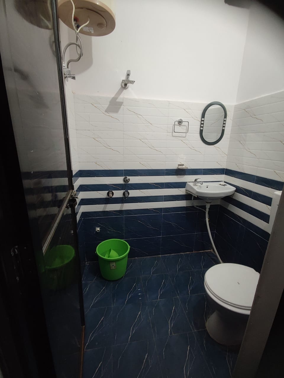 Shower, rainfall showerhead, towels