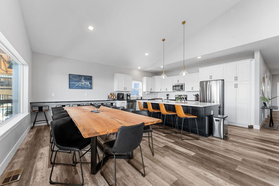 With generous seating and a fully equipped setup, this kitchen is ready to handle meals for the entire group.
