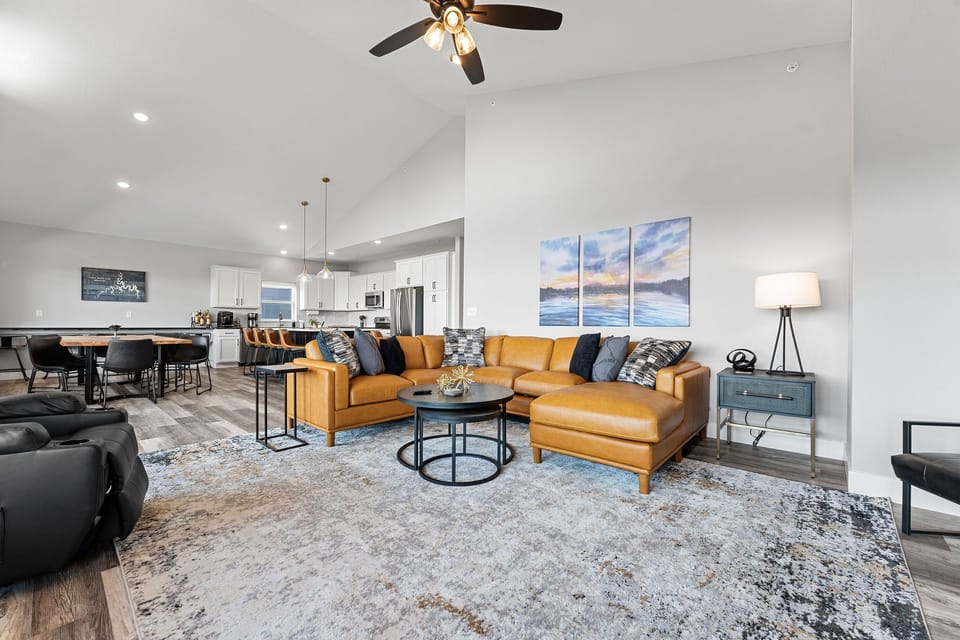 Wake up to calm lake views and prepare meals in the fully equipped kitchen within the open living space.