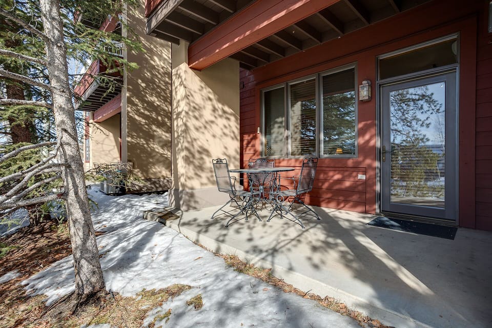 Step onto your private patio and breathe in the fresh mountain air while enjoying morning coffee at your outdoor dining table.