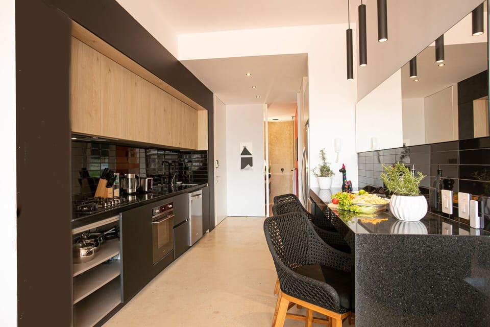 Sleek kitchen with all the amenities needed to prepare full meals