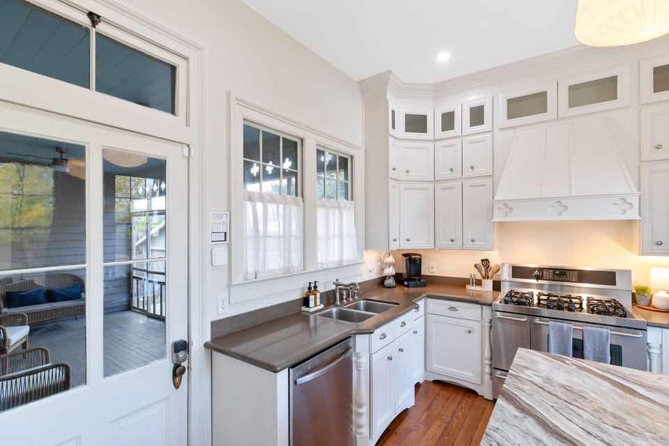Kitchen open to a private screened in porch.