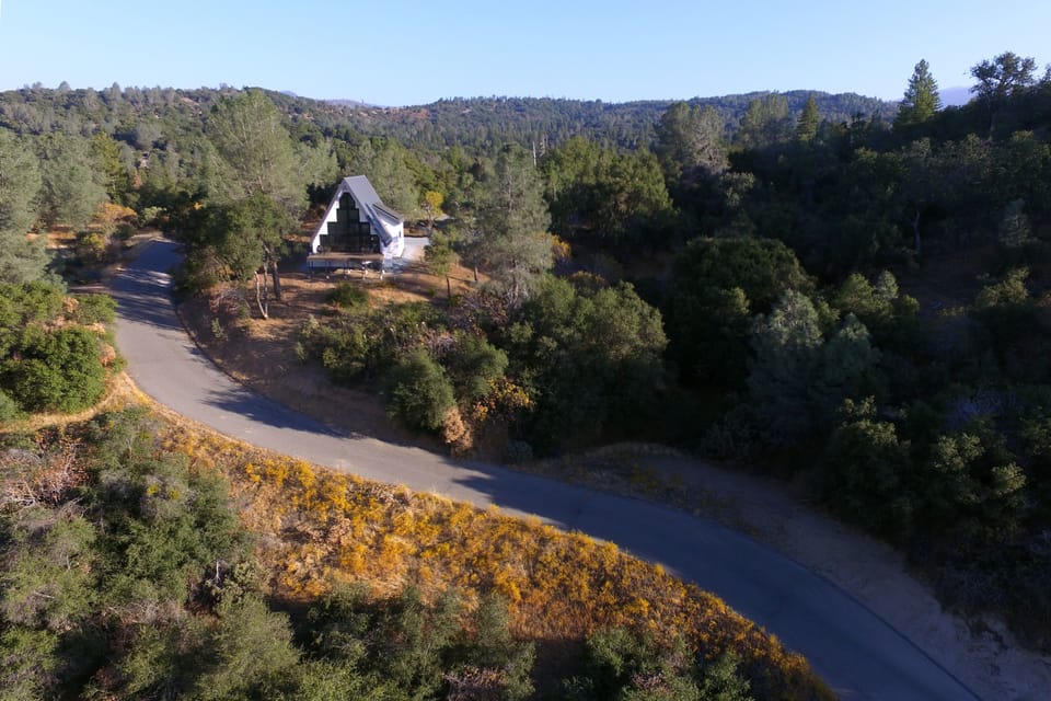Approach our home on a private 1/4 mile road behind a gate on 12.2 acres.