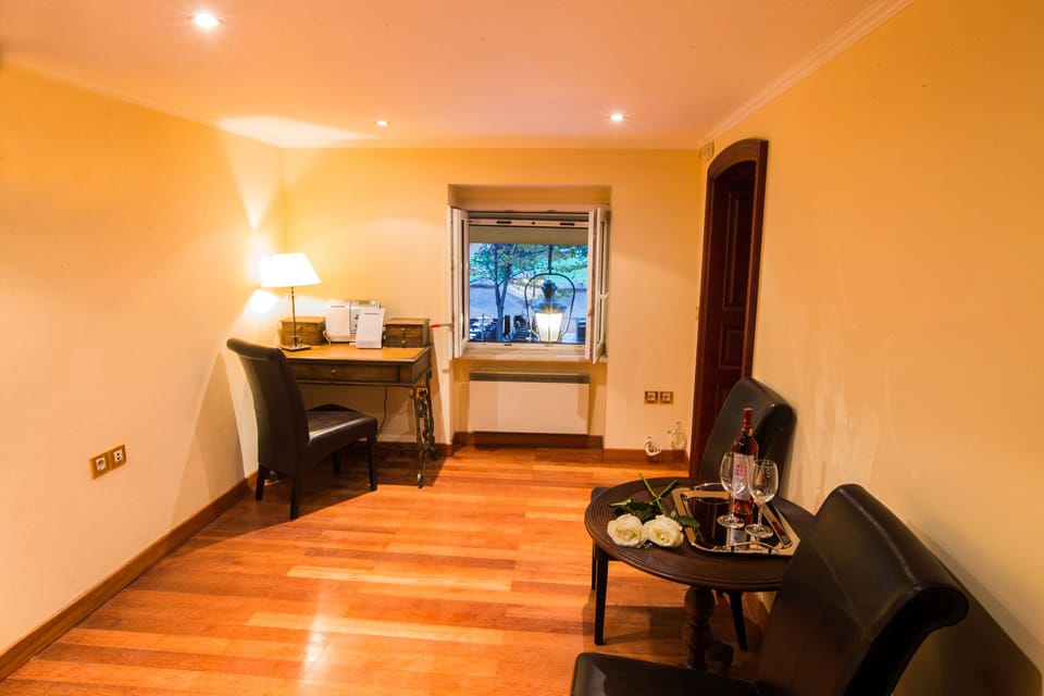 Classic Apartment | Living area | 42-inch plasma TV with cable channels