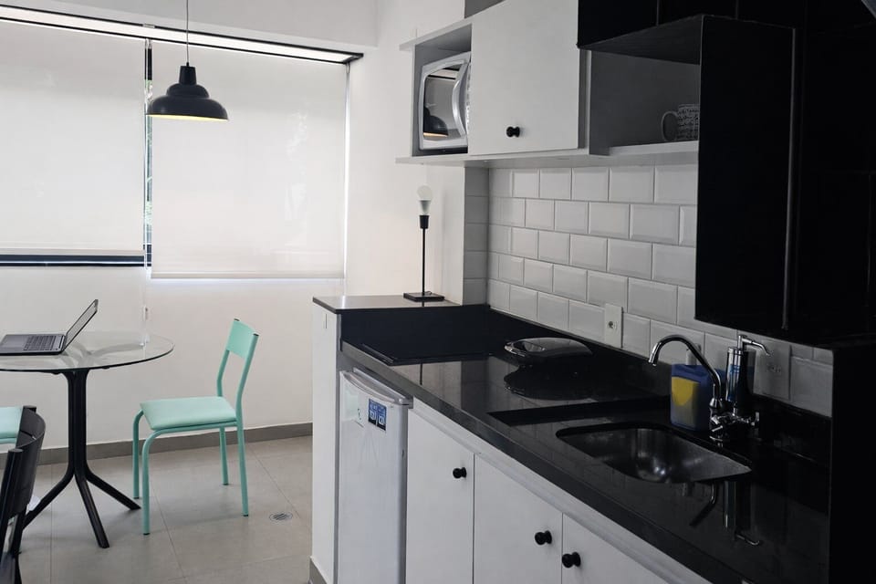 Apartment | Private kitchen | Mini-fridge, microwave, stovetop, cookware/dishes/utensils