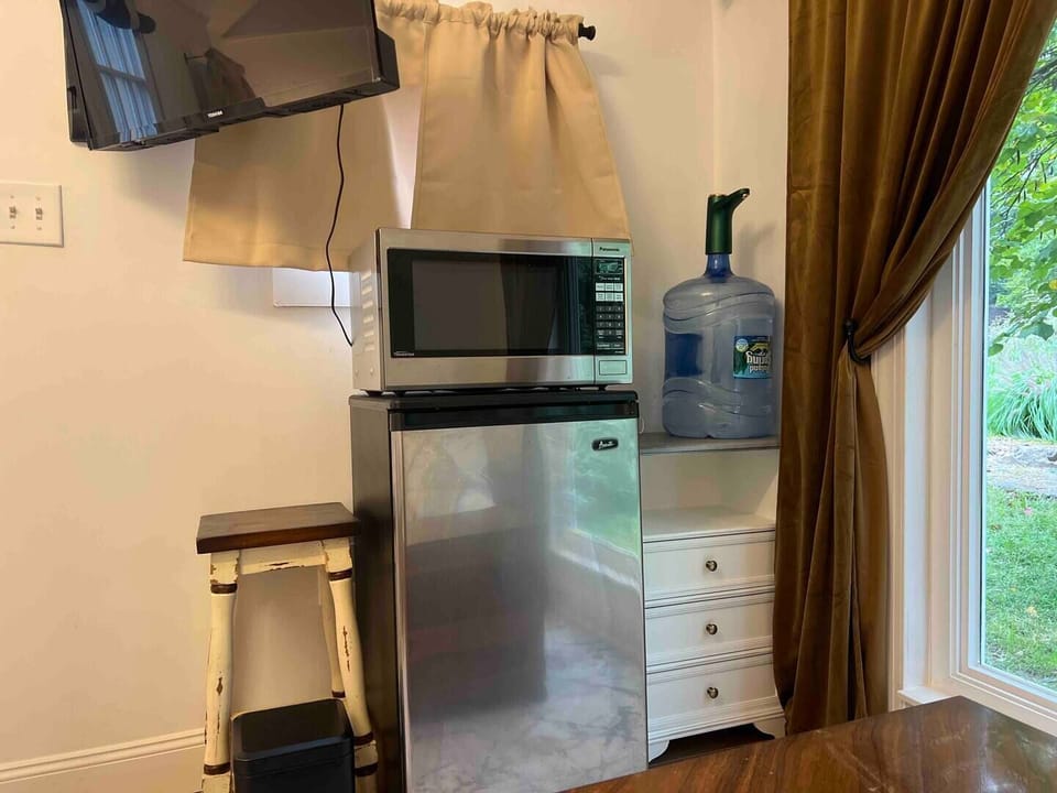 Bedroom 1 has fridge, microwave, drip coffee maker, Nespresso, Milk frother