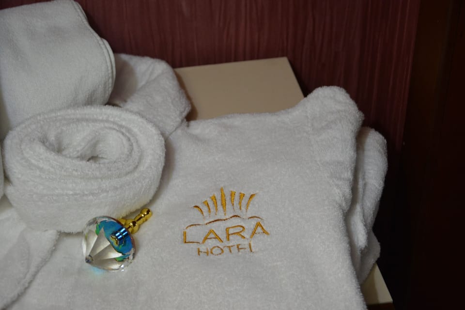 Hair dryer, slippers, towels, soap