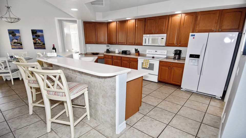 Naturally, the kitchen is fully equipped
