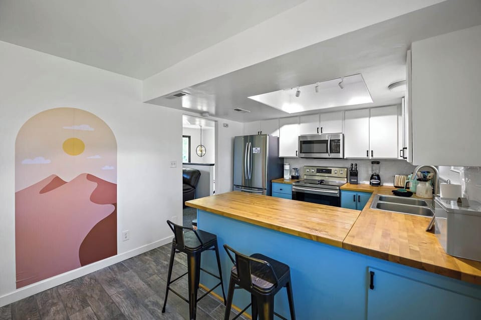 Take a seat at the kitchen island and relax while dinner cooks.
