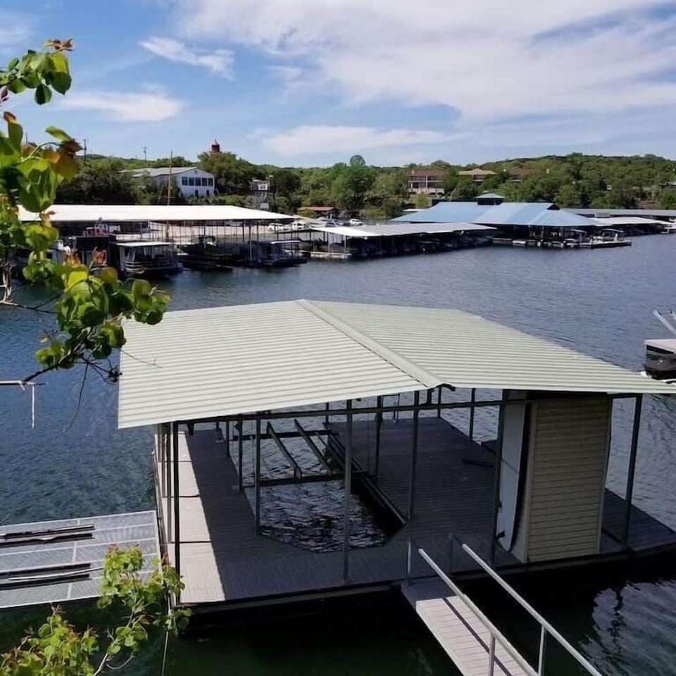 Covered Boat Slip with hoist maximum 25' and 5000lbs and watercraft hoist.