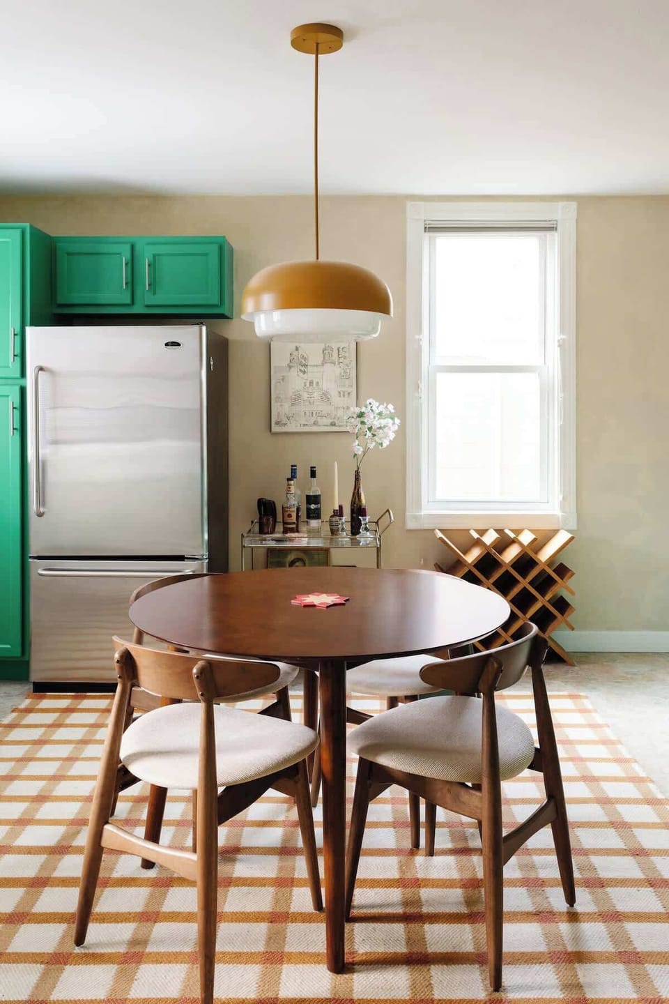 Bright and funky kitchen with mood lighting and round dinning table.

Bar for entertaining.