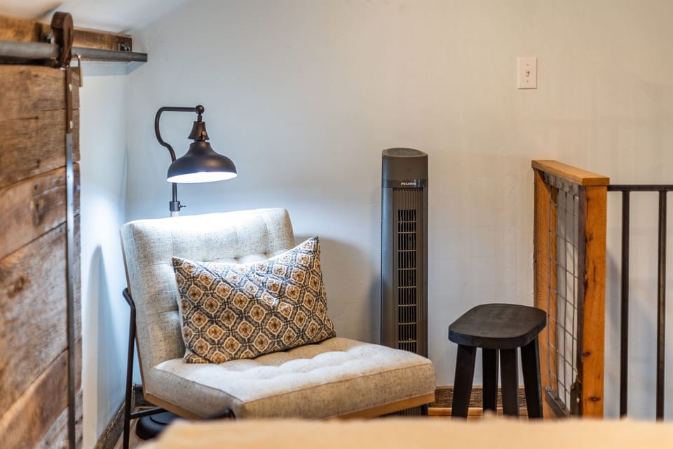 Reading chair with overhead lamp