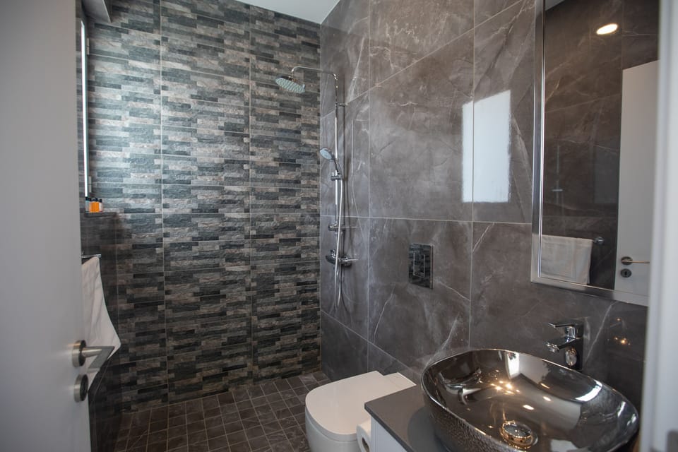 Main Bathroom with shower and WC