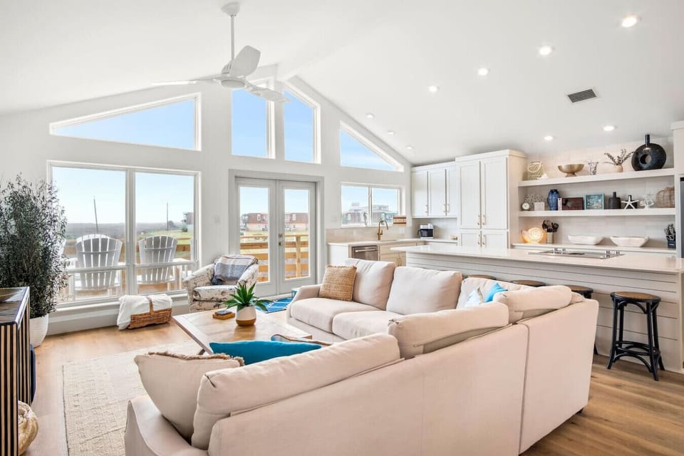 Sunlit Seating Area with Floor-to-Ceiling Windows