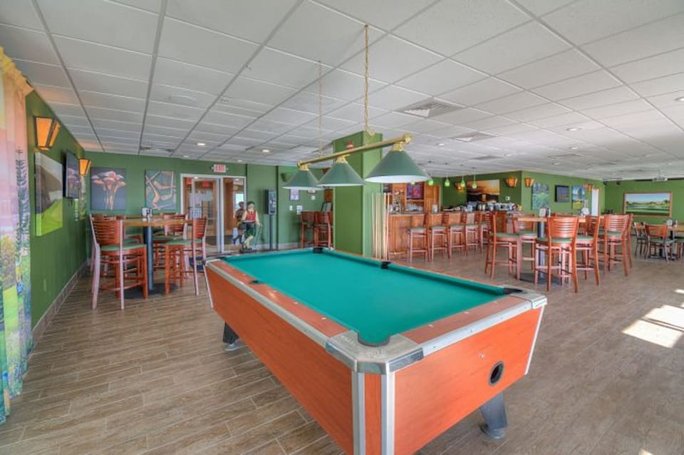 Challenge the kids to a game of pool.